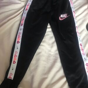 Nike Kids Black Joggers with Pink and White Details